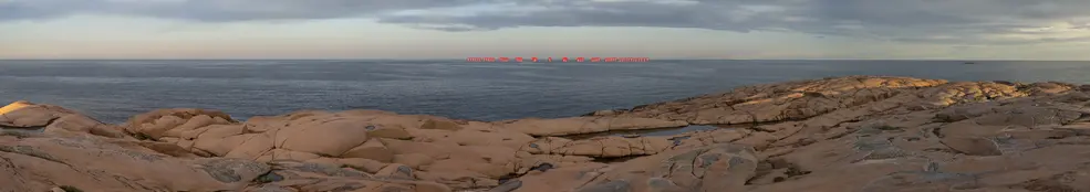 Fotomontage med markering för roterande rotorblad med närmsta verk 50 km från betraktaren.